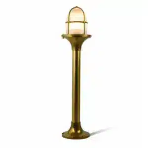 Nautical style brass bollard light with transparent glass for coastal areas