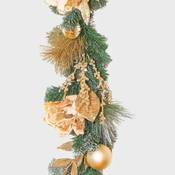 Champagne and magnolia Christmas garland pre decorated close up view