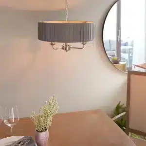 Bright nickel multi arm pendant light with charcoal fabric shade up view