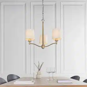 Matt antique brass pendant light with white faux silk shades product view