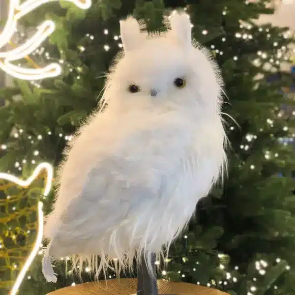 Furry long hair owl indoor Christmas decoration with pointed ears design close up
